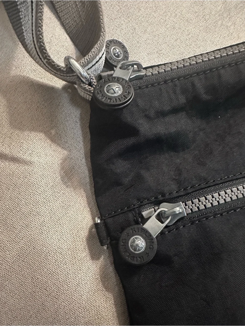 NWOT- Kipling Black Annabelle Crossbody Messenger with Gray Striped Strap